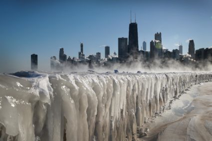 Ice covers the Lake Michigan shoreline on January 30, 2019 in Chicago, Illinois. Businesses and schools have closed, Amtrak has suspended service into the city, more than a thousand flights have been cancelled and mail delivery has been suspended as the city copes with record-setting low temperatures. Photo by Scott Olson/Getty Images