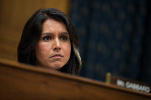 WASHINGTON, DC - NOVEMBER 01: Rep. Tulsi Gabbard (D-HI) listens to testimony from Thae Yong-ho, former chief of mission at the North Korean embassy in the United Kingdom, during a House Foreign Affairs Committee hearing on Capitol Hill, November 1, 2017 in Washington, DC. Yong-ho defected from North Korea in 2016. (Drew Angerer/Getty Images)