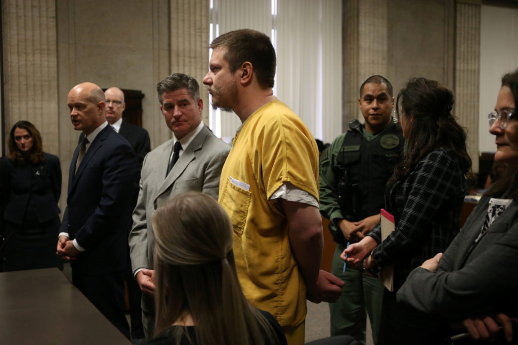 Former Chicago police Officer Jason Van Dyke stands during his sentencing hearing at the Leighton Criminal Court Building ...
