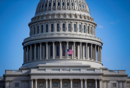 An American flag flies at the U.S. Capitol in Washington, D.C. Photo by Al Drago/Reuters