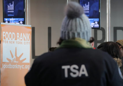 A Transportation Security Administration (TSA) employee receives a donation at a food distribution center for federal workers impacted by the government shutdown, at the Barclays Center in the Brooklyn borough of New York, U.S., January 22, 2019. Photo by Brendan McDermid/Reuters