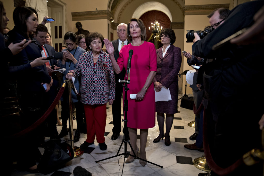 U.S. House Speaker Nancy Pelosi, a Democrat from California, center, speaks during a news conference before a vote on endi...