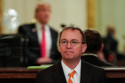 White House Acting Chief of Staff Mick Mulvaney watches as President Donald Trump welcomes the 2018 College Football Playoff National Champion Clemson Tigers in the East Room of the White House in Washington, D.C. Photo by Joshua Roberts/Reuters