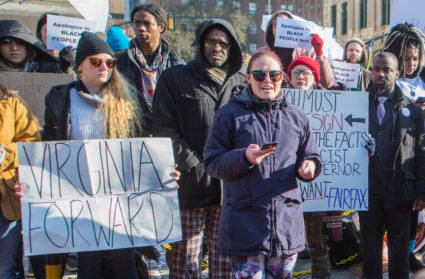 Jessee Perry of RVA Dirt Girls, who organized the demonstration to demand Virginia Gov. Ralph Northam to resign, speaks outside Governor's mansion in Richmond, Virginia. Photo by Jay Paul/Reuters