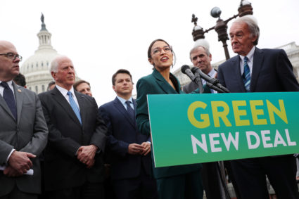 Rep. Alexandria Ocasio-Cortez (D-N.Y.) and Sen. Ed Markey (D-Mass.) hold a news conference for their proposed "Green New Deal" to achieve net-zero greenhouse gas emissions in 10 years, at the U.S. Capitol in Washington, D.C. Photo by Jonathan Ernst/Reuters