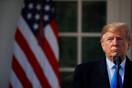 U.S. President Donald Trump pauses during his declaration of a national emergency at the U.S.-Mexico border during remarks about border security in the Rose Garden of the White House in Washington, U.S., February 15, 2019. Photo by Carlos Barria/Reuters