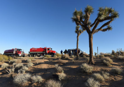 Volunteers, along with two sewage pumping trucks, wait to head into Joshua Tree National Park at the west entrance to help with clean up Thursday morning. Despite the partial federal shutdown Joshua Tree National Park remained open Thursday, January 10, 2019. The park has minimal staffing and campgrounds are now open. There is no park entry fee at the moment. (Photo by Will Lester/MediaNews Group/Inland Valley Daily Bulletin via Getty Images).