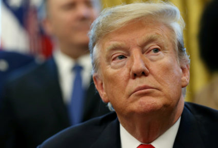 President Donald Trump participates in a presidential memorandum signing for the "Women's Global Development and Prosperity" initiative in the Oval Office at the White House in Washington, D.C. Photo by Leah Millis/Reuters