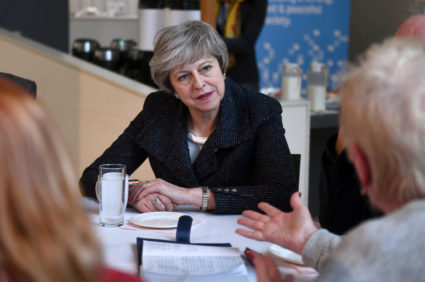 Britain's Prime Minister Theresa May visits a community centre in Belfast, Northern Ireland on February 5, 2019. Photo by Clodagh Kilcoyne/Pool/Reuters