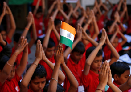 School children offer prayers for the release of an Indian Air Force pilot after he was captured by Pakistan, inside a school in Ahmedabad, India, February 28, 2019. REUTERS/Amit Dave