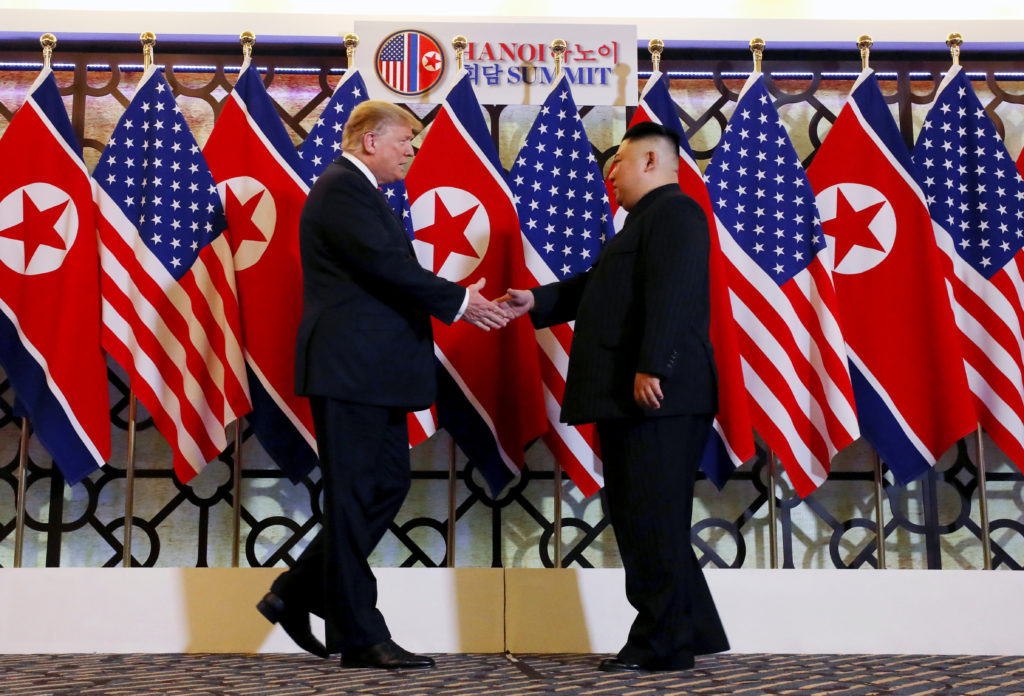 U.S. President Donald Trump and North Korean leader Kim Jong Un shake hands before their one-on-one chat during the second...