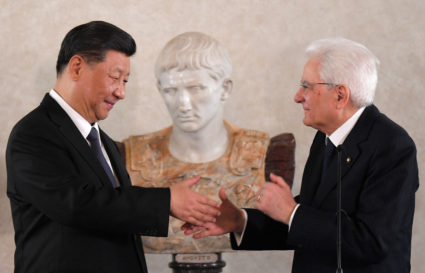Chinese President Xi Jinping and Italian President Sergio Mattarella shake hands after addressing a forum of businessmen, at the Quirinal Palace, in Rome, Italy, on March 22, 2019. Photo by Tiziana Fabi/Pool via Reuters