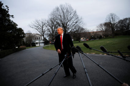 President Donald Trump walks away from talking to reporters about the report of Special Counsel Robert Mueller as he returns from a weekend in Florida at the White House in Washington, D.C. Photo by Carlos Barria/Reuters