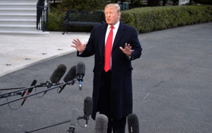 President Donald Trump makes brief remarks to the press on Special Counsel Robert Mueller's investigation as he arrives on the South Lawn of the White House in Washington, U.S., after returning from a weekend at his Mar-a-Lago estate in Florida. Photo by Mike Theiler/Reuters