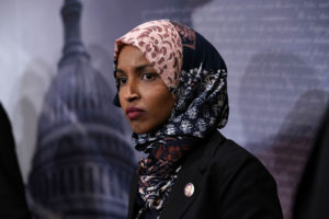 Rep. Ilhan Omar (D-Minn.) listens during a news conference on prescription drugs Jan. 10, 2019 at the Capitol in Washington, D.C. Photo by Alex Wong/Getty Images