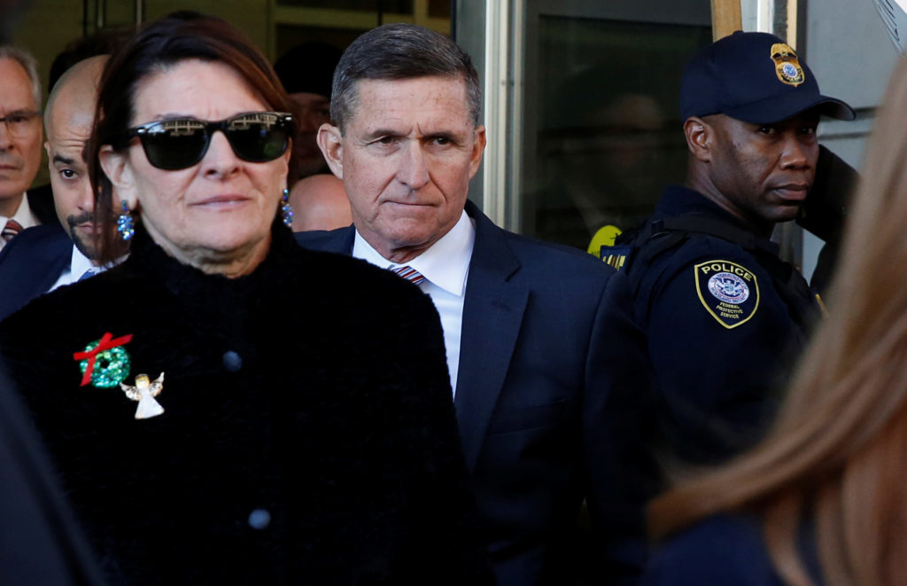 Former U.S. national security adviser Michael Flynn departs after his sentencing was delayed at U.S. District Court in Was...