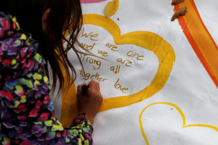 As New Zealand shooter appears in court, world rallies behind Muslim communities