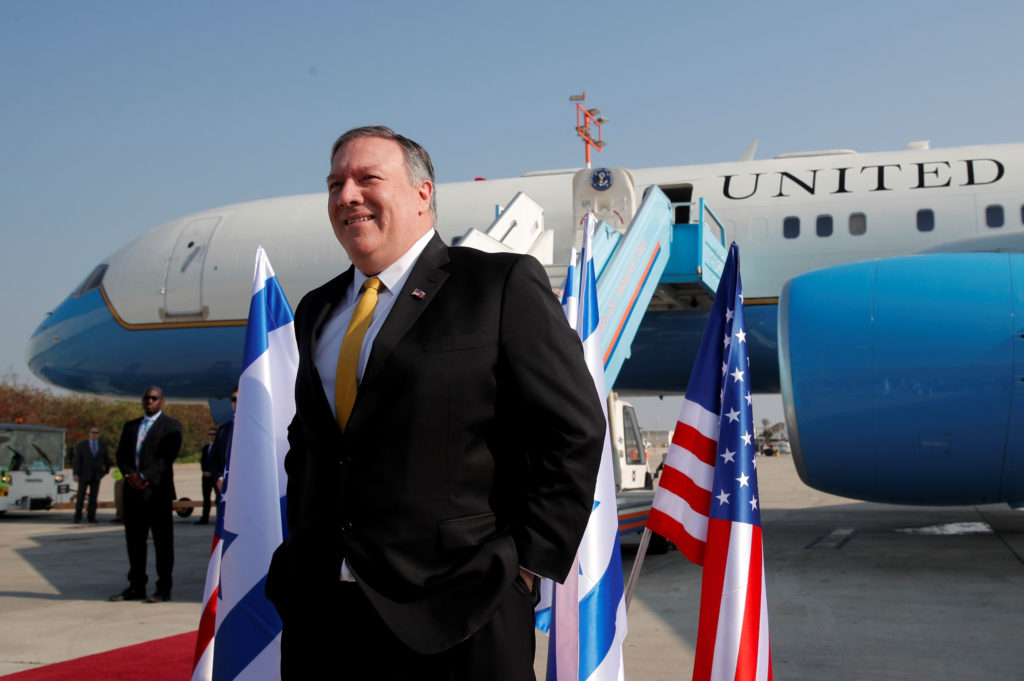 Secretary of State Mike Pompeo stands next to his airplane before boarding it to Beirut at Ben Gurion airport near Lod, Is...