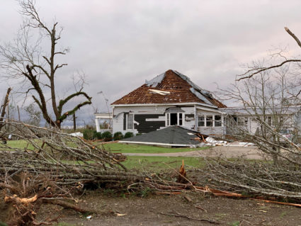 Debris and a damaged house seen following a tornado in Beauregard, Alabama, in this March 3, 2019 still image obtained from social media video. Image by Scott Fillmer via Reuters