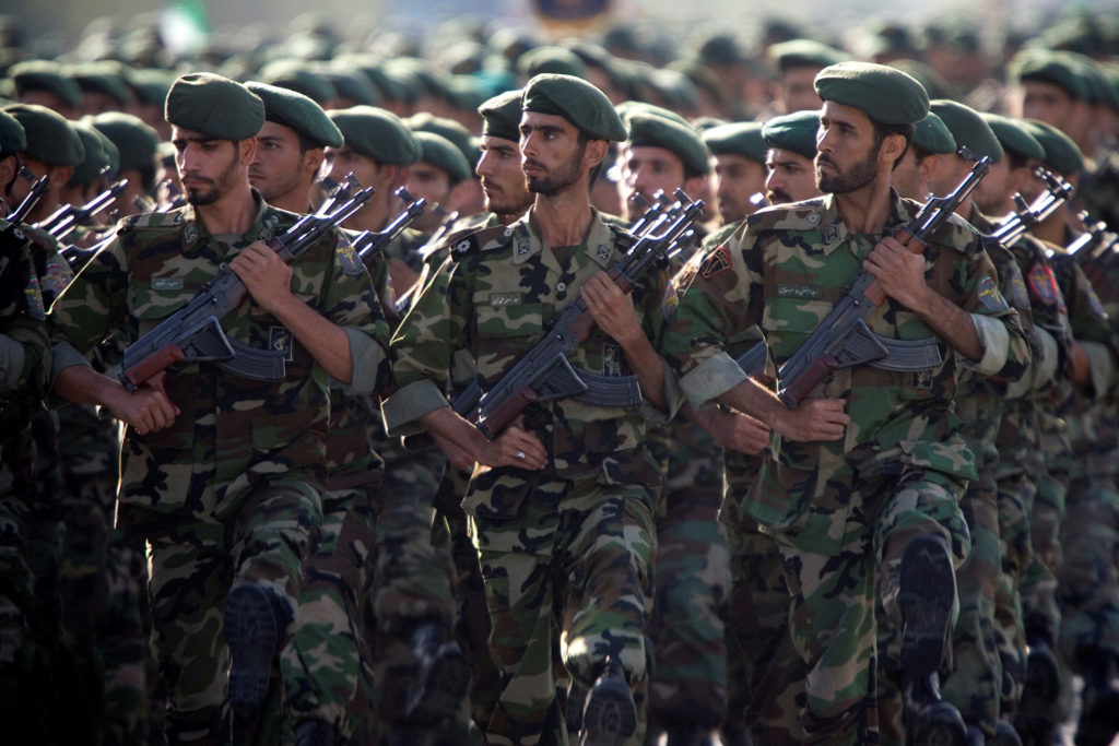 Members of Iran's Revolutionary Guards march during a military parade to commemorate the 1980-88 Iran-Iraq war in Tehran. ...