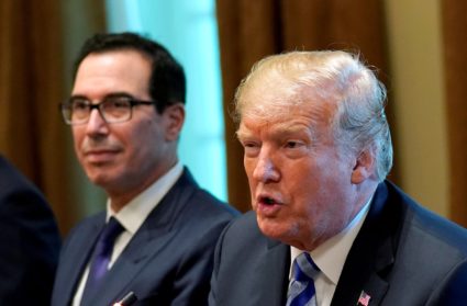 File photo of President Donald Trump seated with Treasury Secretary Steve Mnuchin during his meeting at the White House on Sept. 5, 2018. Photo by Kevin Lamarque/Reuters