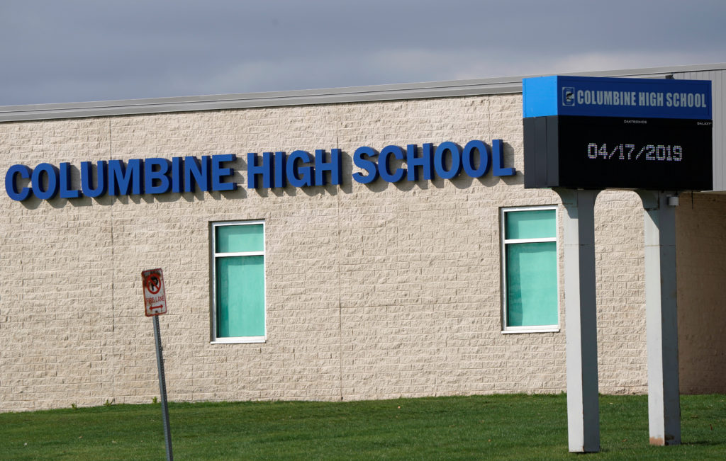 The digital sign is pictured outside Columbine high school as some Denver area schools have closed while police search for...