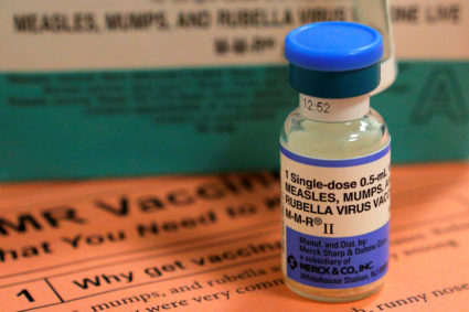 A vial of measles, mumps and rubella vaccine and an information sheet is seen at Boston Children's Hospital in Boston, Massachusetts February 26, 2015. Photo by REUTERS/Brian Snyder