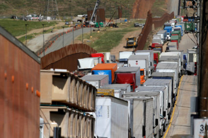 Trucks wait in a long queue for border customs control to cross into the U.S., caused by the redeployment of border officers to deal with a surge in migrants, at the Otay border crossing in Tijuana, Mexico April 2, 2019. Photo by Jorge Duenes/Reuters