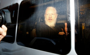 WikiLeaks founder Julian Assange is seen in a police van, after he was arrested by British police, in London, Britain. Photo by Henry Nicholls/Reuters