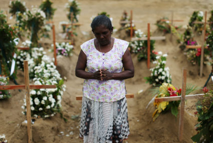 A woman reacts during mass burials near St. Sebastian church in Negombo, Sri Lanka April 28, 2019. Photo by Athit Perawongmetha/Reuters