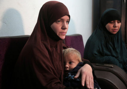 FILE PHOTO: Belgian women Tatiana Wielandt and Bouchra Abouallal, both 26, who joined Islamic State in Syria are pictured in Ain Issa, Syria March 10, 2019. While some countries have repatriated former members of ISIS on an ad hoc basis in the past, the fall of the caliphate has forced the U.S. and its allies to seek a more permanent fix. REUTERS/Issam Abdallah/File Photo.