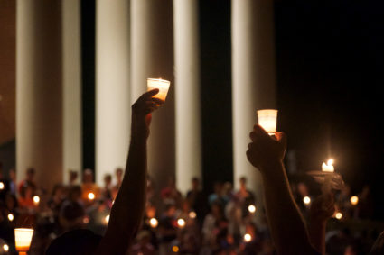 Members of the Charlottesville community hold a vigil for Heather Heyer following a protest organized by white nationalists that turned deadly at the University of Virginia in Charlottesville, Virginia, in 2017. Courtesy Kate Bellows/The Cavalier Daily/Handout via REUTERS