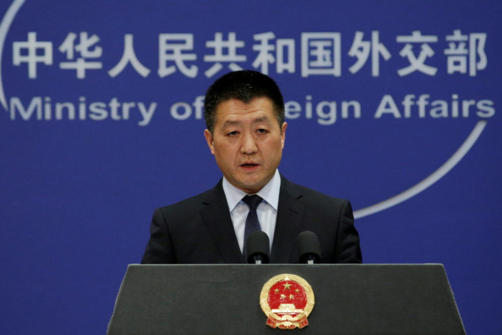 Chinese Foreign Ministry spokesman Lu Kang answers questions during a news conference in Beijing, China on April 23, 2018....