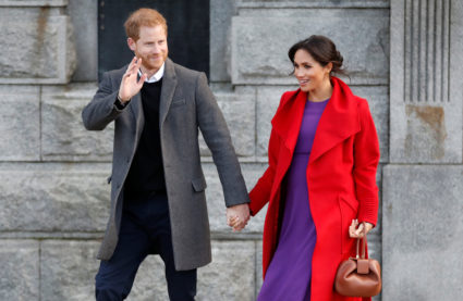 Prince Harry and Meghan, Duchess of Sussex react during their visit in Birkenhead, Britain on January 14, 2019. Photo by Carl Recine/Reuters