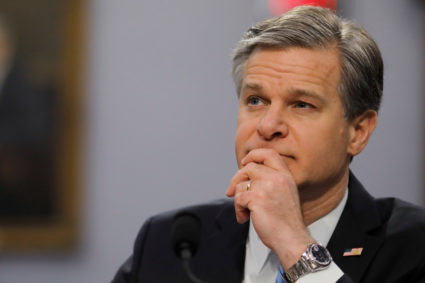 FBI Director Christopher Wray listens to a question as he testifies on the FBI's budget request before a House Appropriations Subcommittee hearing on Capitol Hill in Washington, on April 4, 2019. Photo by Carlos Barria