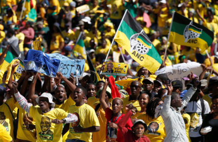 Supporters of South Africa's governing African National Congress carry a mock coffin of the opposition Democratic Alliance during a party rally at Ellis Park Stadium in Johannesburg, South Africa, on May 5, 2019. Photo by Siphiwe Sibeko/Reuters