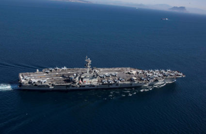 The Nimitz-class aircraft carrier USS Abraham Lincoln transits the Strait of Gibraltar, entering the Mediterranean Sea as it continues operations in the 6th Fleet area of responsibility in this April 13, 2019 photo supplied by the U.S. Navy. Photo by U.S. Navy/Mass Communication Specialist 2nd Class Clint Davis/Handout via Reuters