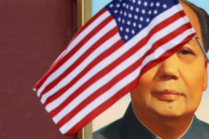 FILE PHOTO: A U.S. flag flutters in front of a portrait of the late Chinese Chairman Mao Zedong at Tiananmen gate during the visit by U.S. President Donald Trump to Beijing, China, on November 8, 2017. Photo by Damir Sagolj/Reuters