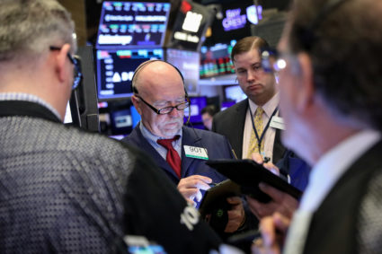 Traders work on the floor at the New York Stock Exchange on May 8, 2019. Photo by Brendan McDermid/Reuters