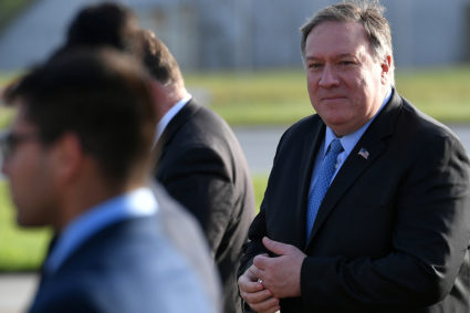 U.S. Secretary of State Mike Pompeo walks to board a plane before departing from London Stansted Airport, north of London, on May 9, 2019. Photo by Mandel Ngan/Pool via Reuters