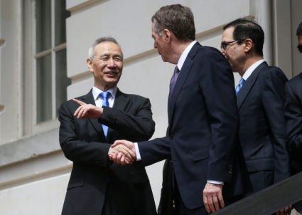 Chinese Vice Premier Liu He talks with U.S. Trade Representative Robert Lighthizer and Treasury Secretary Steven Mnuchin as he departs a round of trade talks in Washington, on May 10, 2019. Photo by Clodagh Kilcoyne/Reuters