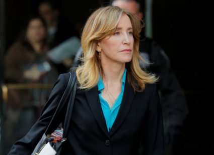 Actor Felicity Huffman, facing charges in a nationwide college admissions cheating scheme, leaves federal court in Boston, Massachusetts, on April 3, 2019. Brian Snyder/Reuters