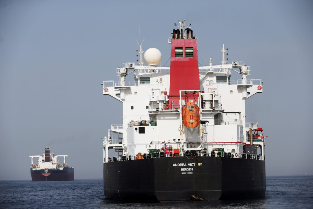 A damaged Andrea Victory ship is seen off the Port of Fujairah, United Arab Emirates, on May 13, 2019. Photo by Satish Kum...