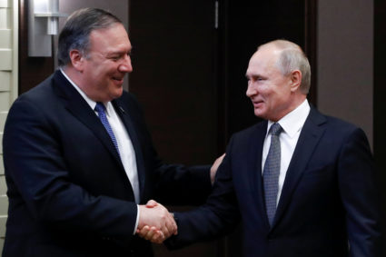 Russian President Vladimir Putin and U.S. Secretary of State Mike Pompeo shake hands prior to their talks in the Black Sea resort city of Sochi, Russia, on May 14, 2019. Photo by Pavel Golovkin/Pool via Reuters