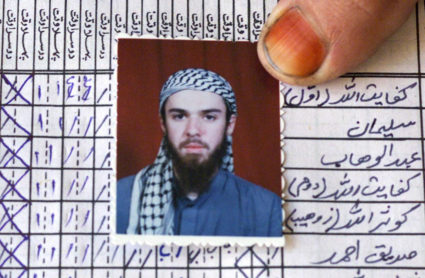 A picture of John Walker Lindh is shown on the attendance register of the madrassa (Islamic school) Arabia Hassani Kalan Surani Bannu, in Bannu in Pakistan, January 26, 2002. Photo by Haider Shah/Reuters File Photo