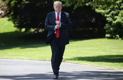 U.S. President Donald Trump leaves the Oval Office to speak to the news media before boarding Marine One to depart for travel to Japan from the South Lawn of the White House in Washington, on May 24, 2019. Photo by Leah Millis/Reuters