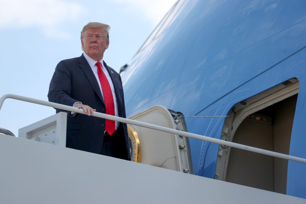 U.S. President Donald Trump boards Air Force One for travel to Colorado from Joint Base Andrews, Maryland, May 30, 2019. P...
