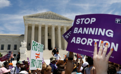 FILE PHOTO: Abortion rights activists rally outside the U.S. Supreme Court in Washington, U.S., May 21, 2019. REUTERS/Kevin Lamarque/File Photo