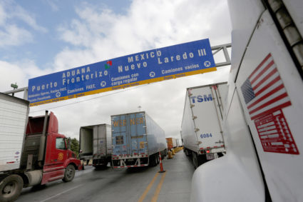 Trucks wait in the queue for border customs control to cross into U.S. at the World Trade Bridge in Nuevo Laredo, Mexico, on November 2, 2016. Mexico is the United States' largest trading partner. Photo by Daniel Becerril/Reuters