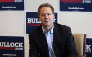 Montana Governor Steve Bullock talks to the media as he launches a 2020 U.S. presidential campaign in Helena, Montana, U.S., May 14, 2019. REUTERS/Jim Urquhart - RC13259D90E0